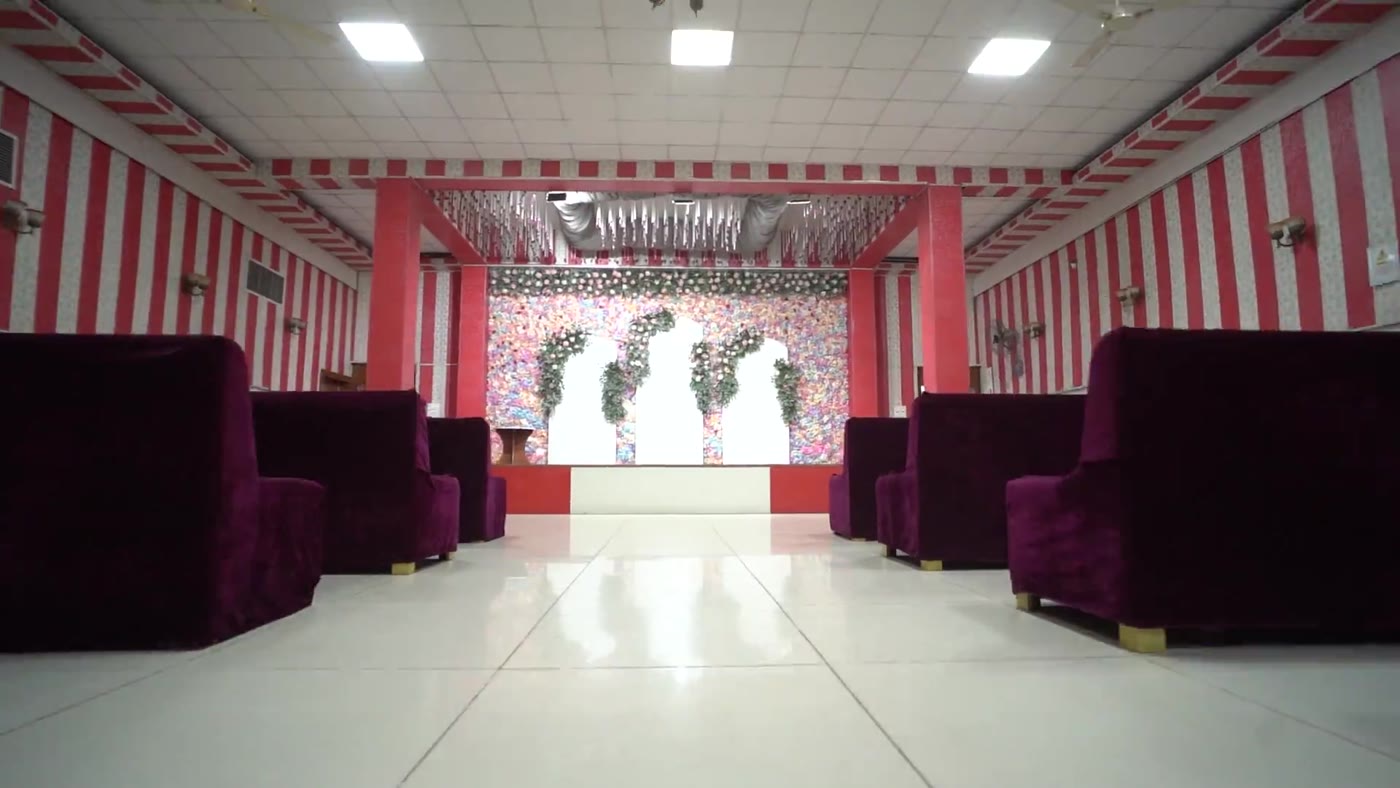 Banquet chairs and stage set up for a sangeet evening